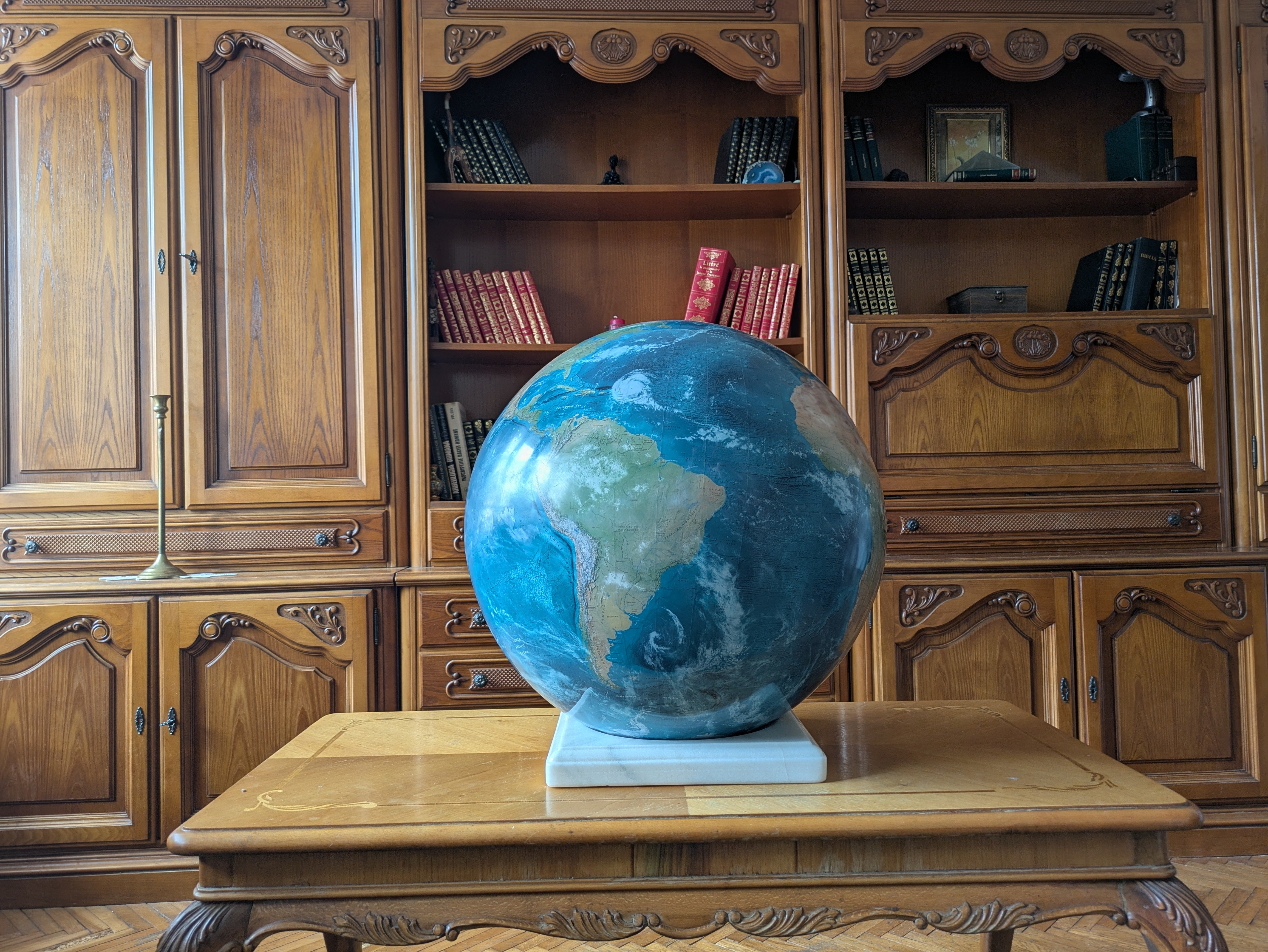 Decorative world globe displaying the Gulf of America, formerly known as the Gulf of Mexico, with current political map details.